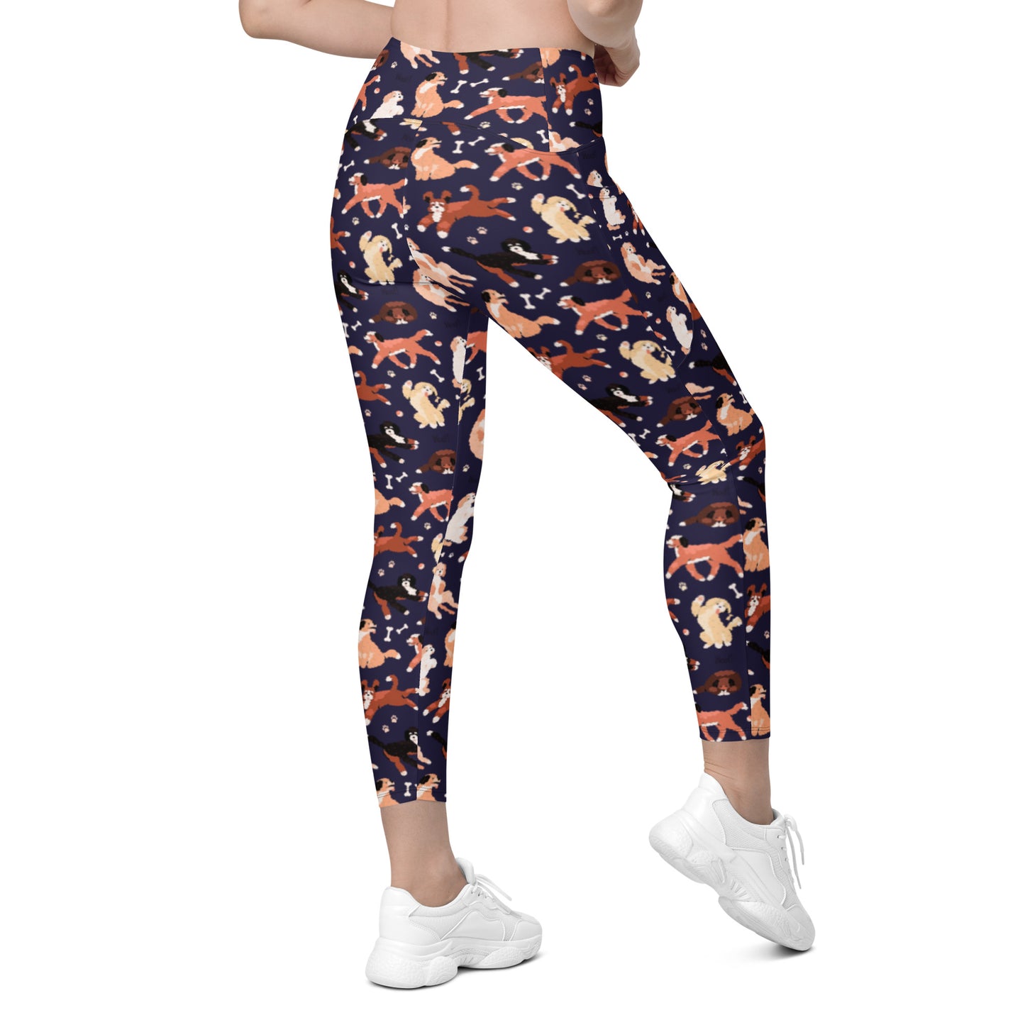 back of Pixie and Sherbet’s Puppy Parade Crossover Leggings with a playful dog print, high-waisted crossover waistband, and side pockets.