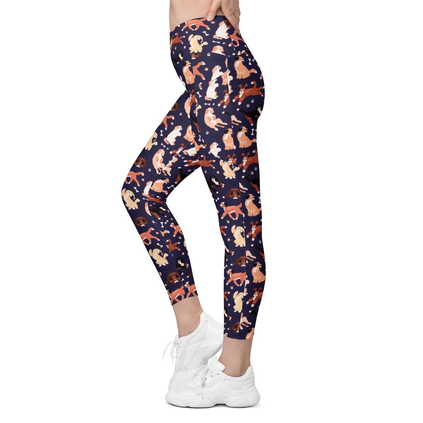 Side view of Pixie and Sherbet’s Puppy Parade Crossover Leggings with a playful dog print, high-waisted crossover waistband, and side pockets.