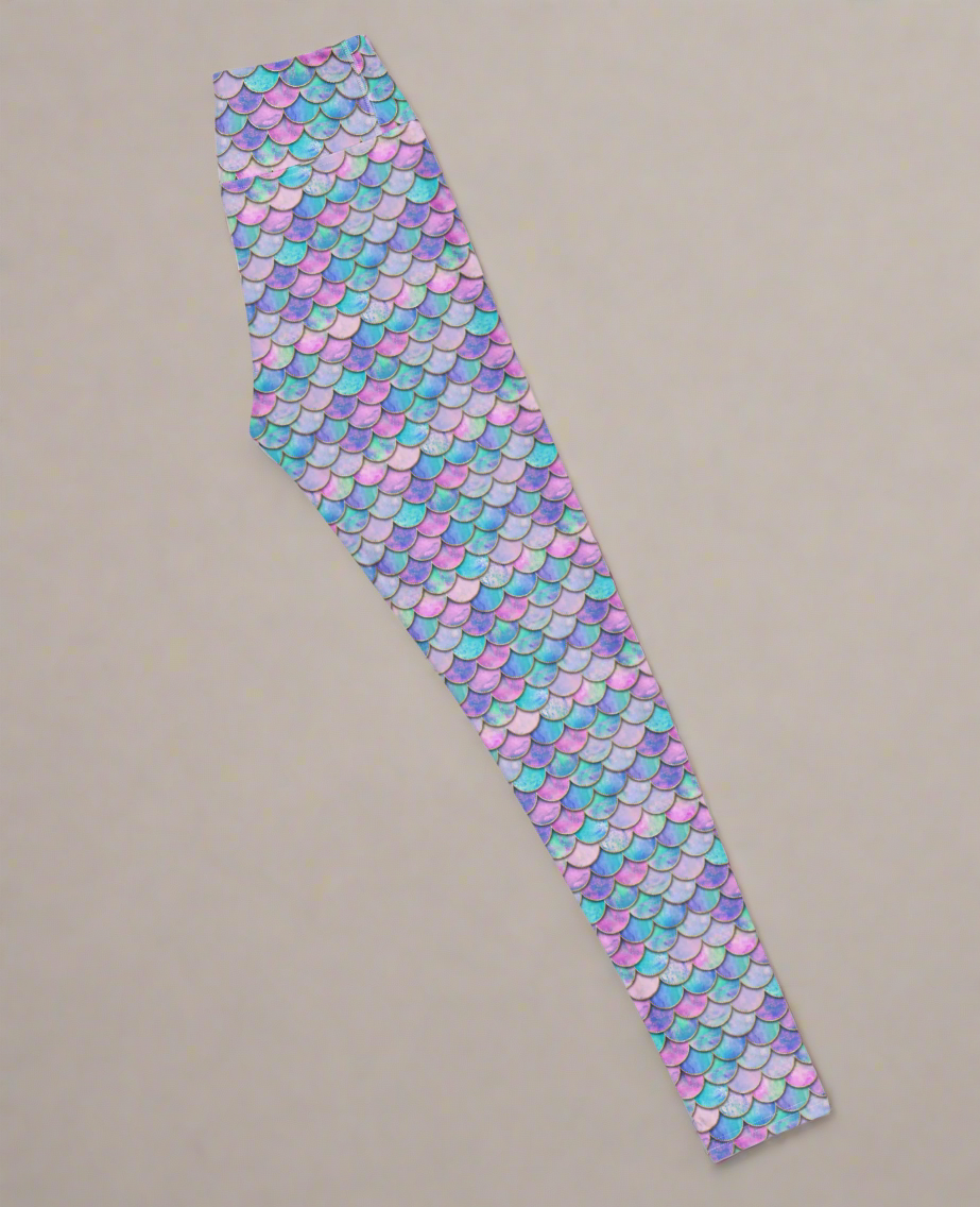Right side of Lumina Siren Yoga leggings with mermaid scale pattern on a light grey background