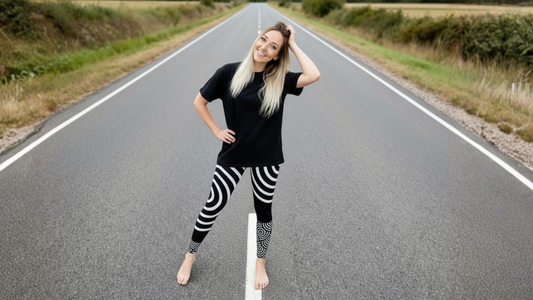 Image of Alicia Cousins standing in Luna Loop Yoga leggings, on a country road.