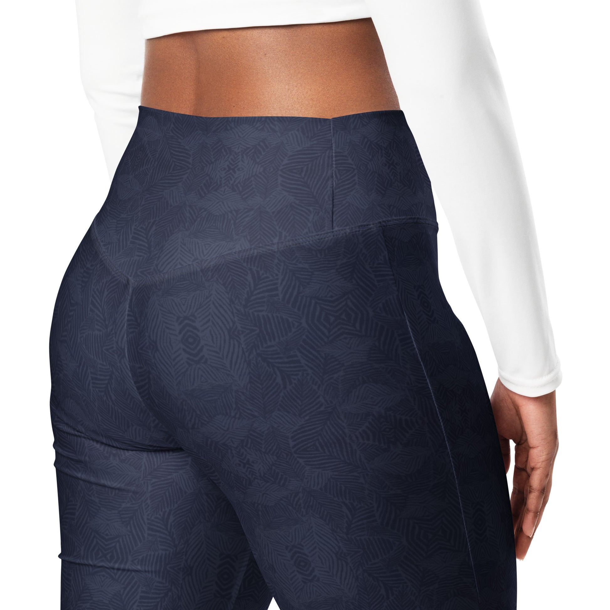 Shadowleaf Flare Leggings with a subtle dark botanical print, high waist, butt-lifting cut, and flared legs.