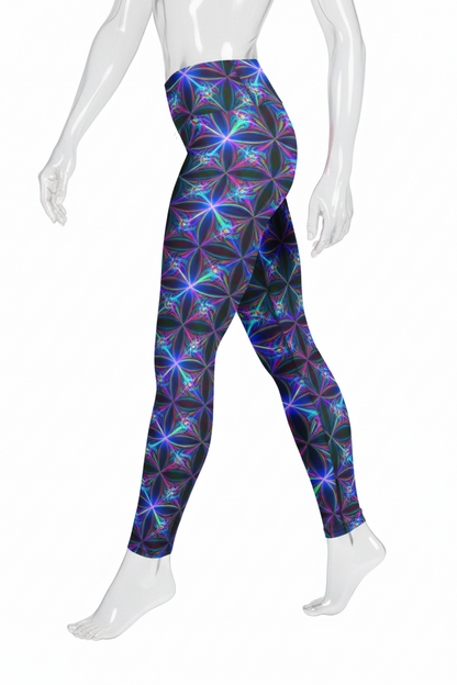 A mannequin modeling high-waisted leggings with a vivid neon floral fractal pattern in blue, purple, pink, and cyan on a black base, paired with black athletic shoes against a plain white background.