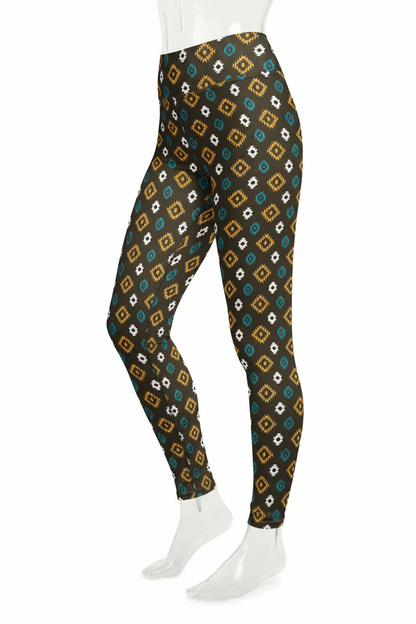 A mannequin modeling high-waisted leggings with a repeating geometric pattern in teal, mustard yellow, white, and black on a plain white background.