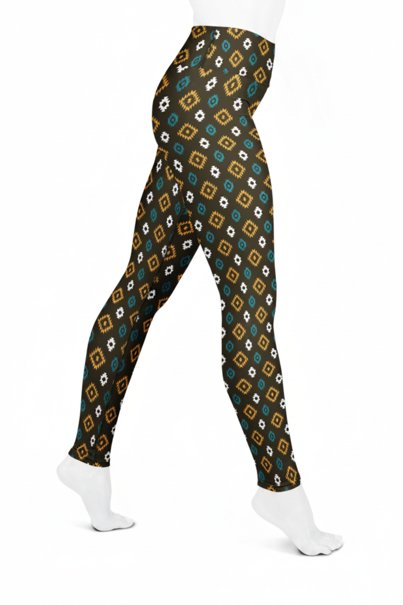 A mannequin modeling high-waisted leggings with a repeating geometric diamond pattern in teal, mustard yellow, white, and black on a white studio background.