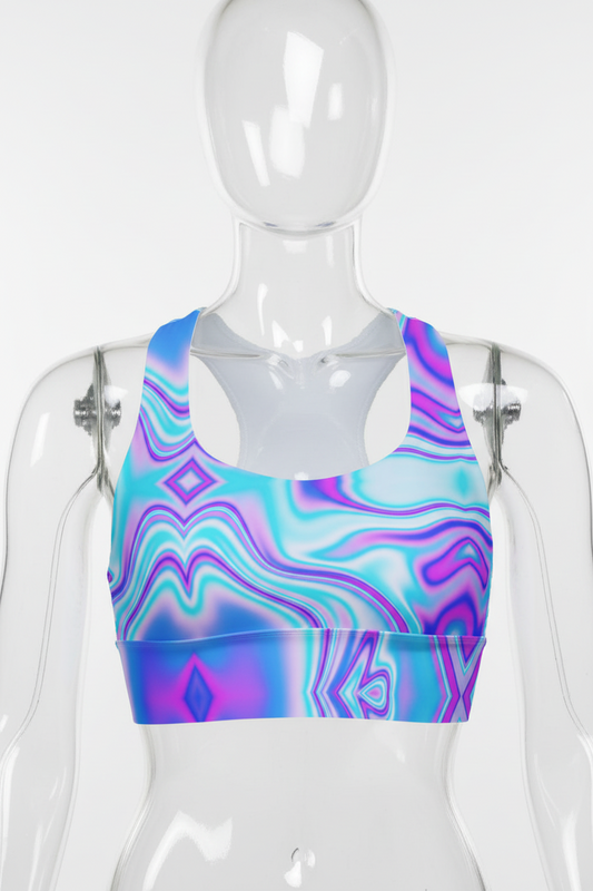 A mannequin wearing a sports bra with a vibrant, multicolored psychedelic swirl pattern in shades of blue, purple, and pink, set against a plain white background.
