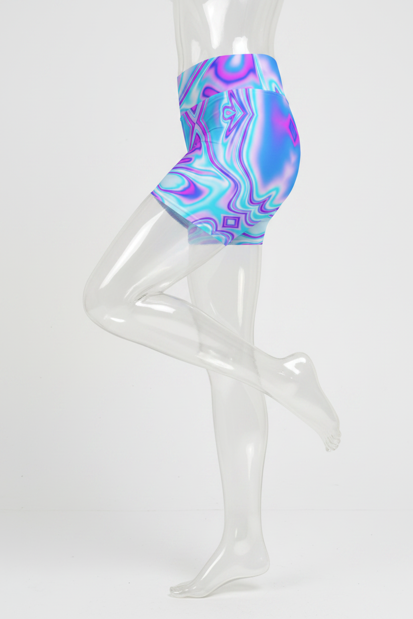 A close-up of a mannequin wearing high-waisted athletic shorts with a vibrant, glossy psychedelic swirl pattern in shades of blue, purple, and white, set against a plain white background.