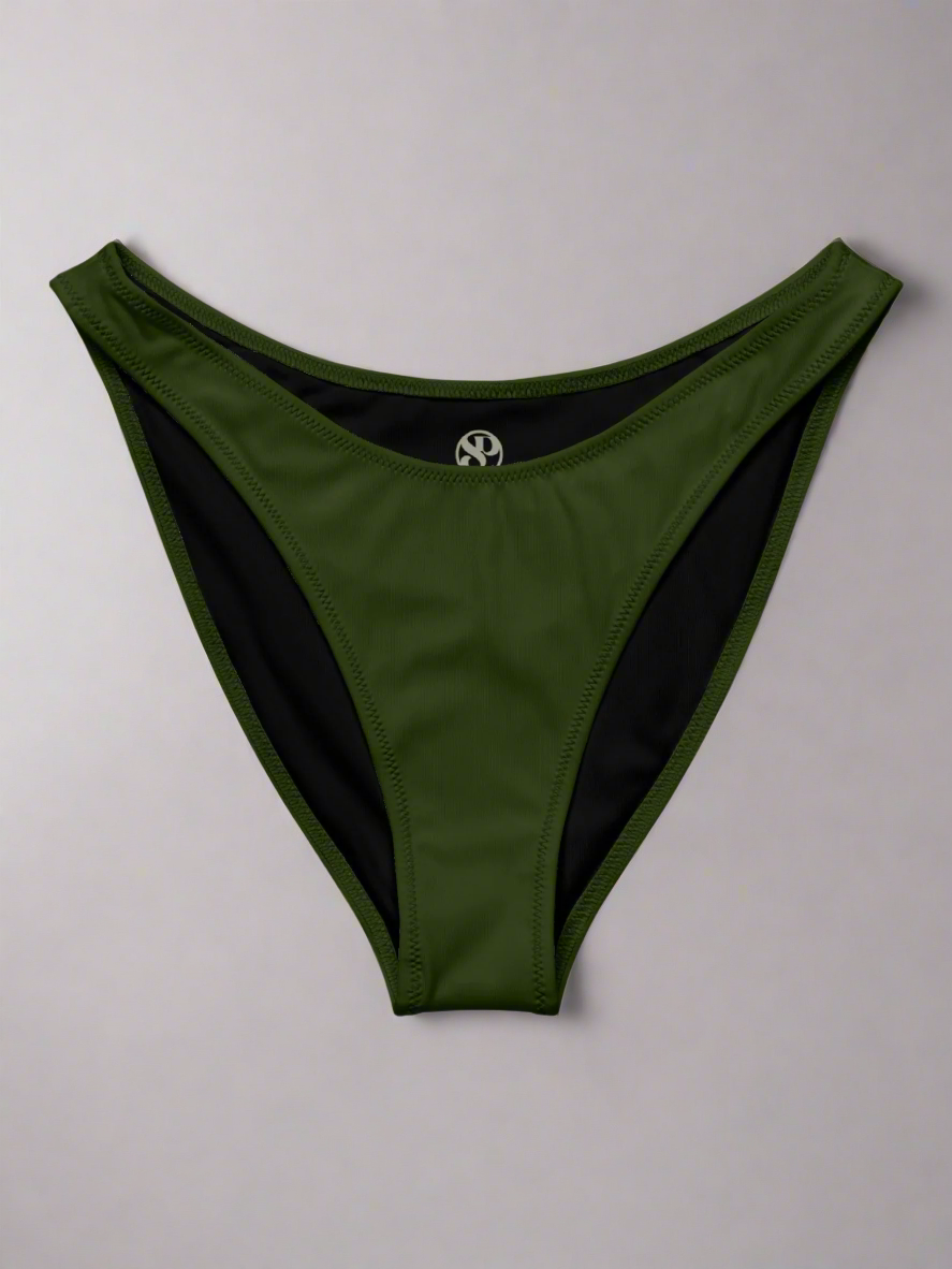 Flat lay of Jade Muse V‑Cut Bikini Bottom in rich jade green against light background to showcase flattering high‑leg cut and smooth luxe fabric.