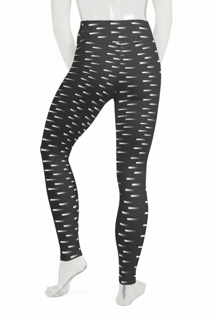 Black high-waisted leggings with a white dash pattern, shown on a mannequin from the back against a white background.