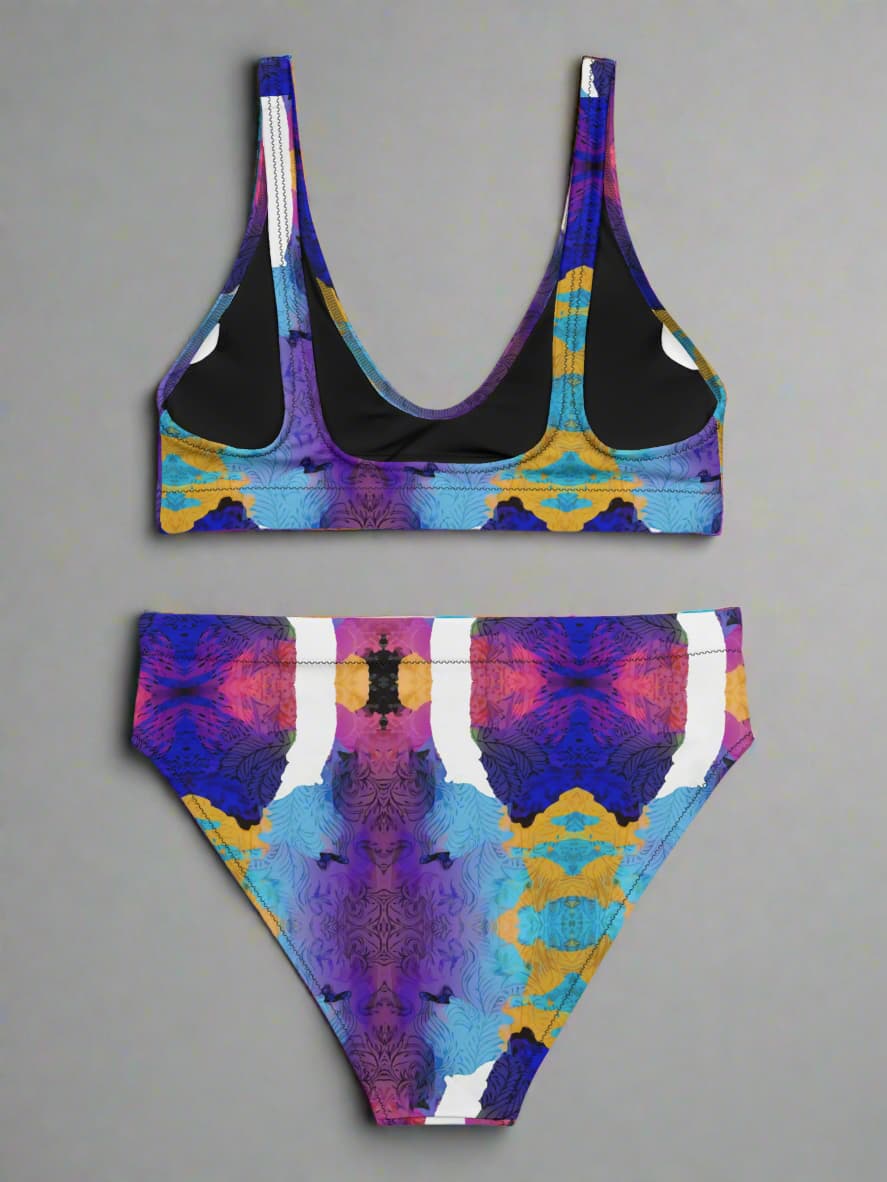 Colorful bikini set with abstract pattern on a gray background