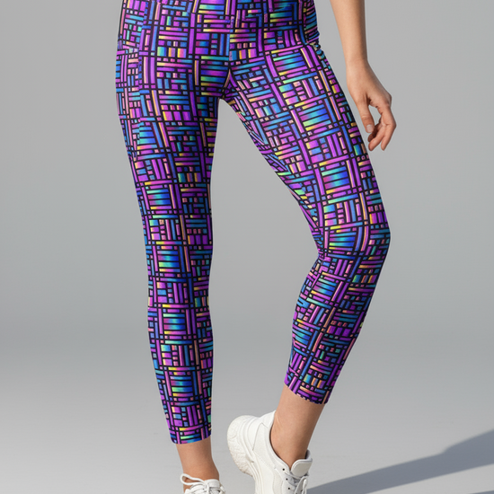 Close up, front view of bright, colourful Pixel Pulse Crossover leggings by Pixie and Sherbet.