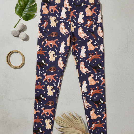 Navy leggings with dog pattern on a light gray background