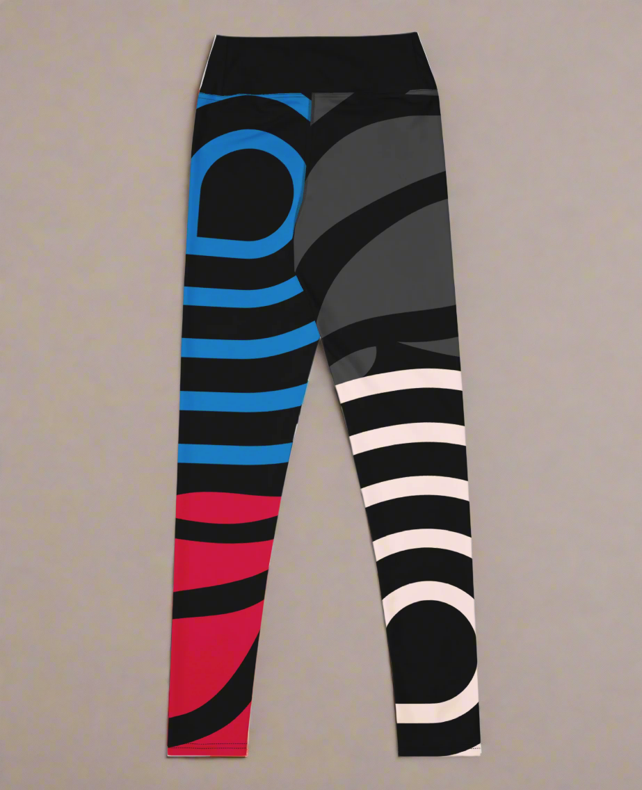 Back flat lay view of colourful abstract patterned leggings on a grey background