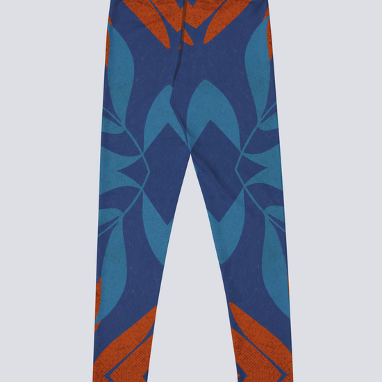 Blue and burnt orange patterned yoga leggings on a light grey background