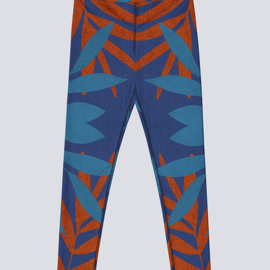 Blue and burnt orange patterned yoga leggings on a light grey background