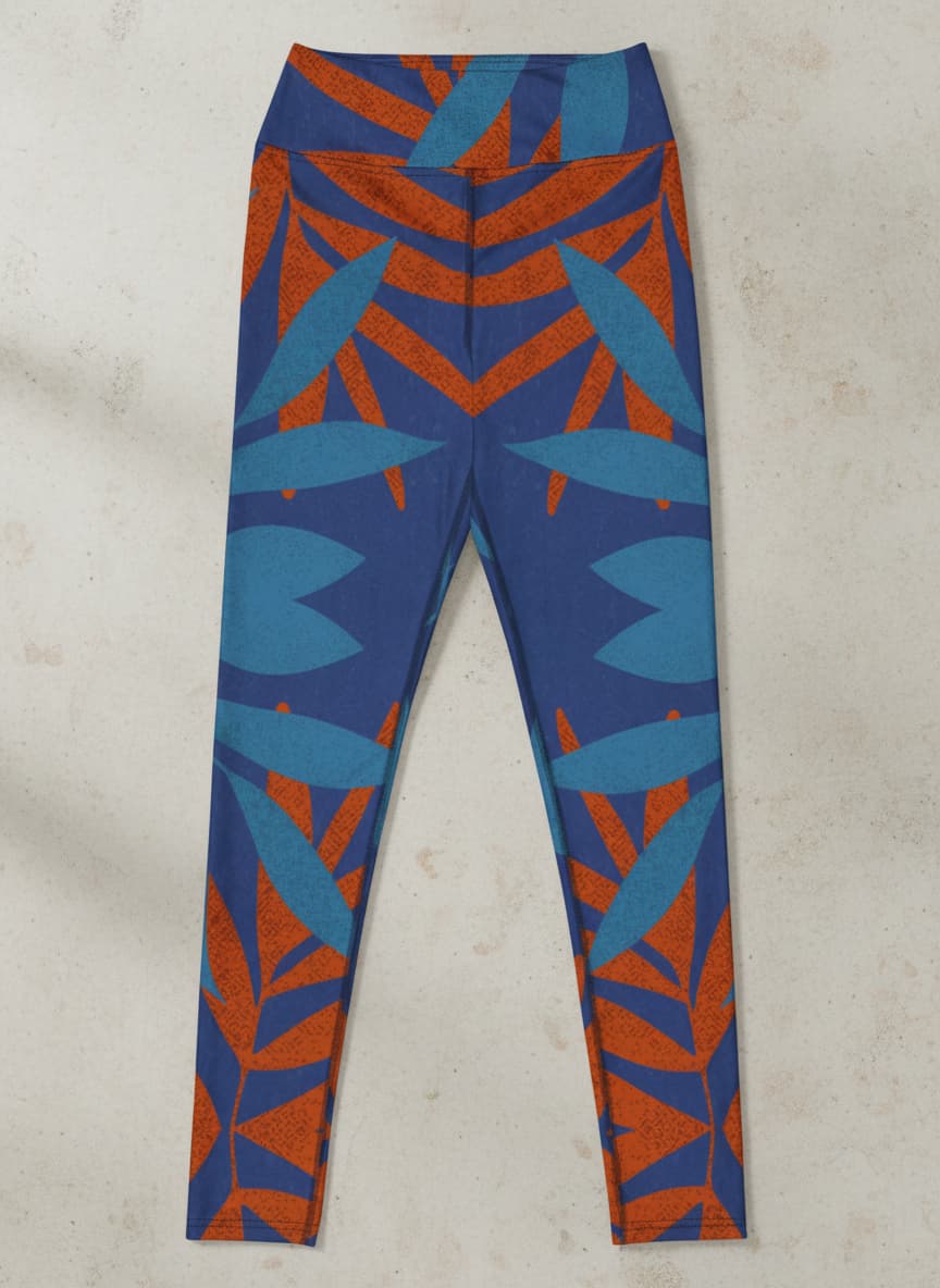 Blue and orange patterned leggings on a textured beige background