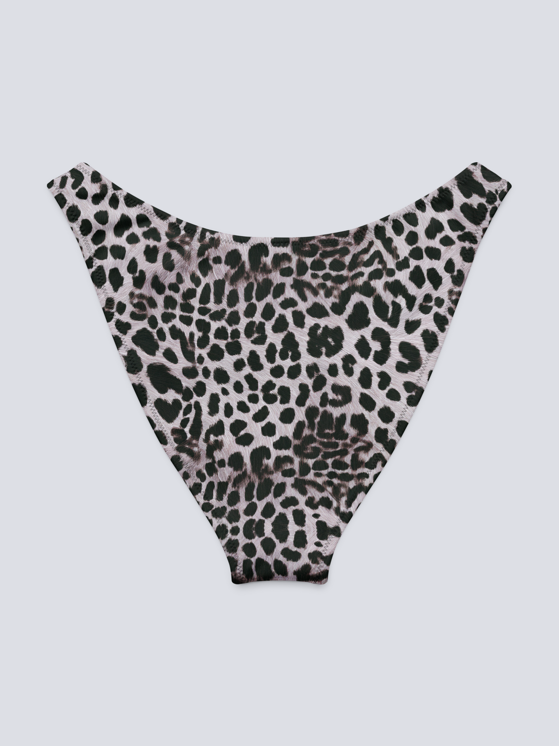 Flat-lay of Savannah Charge Cheeky Bikini Bottoms in high-cut monochrome leopard print – bold, sculpting swimwear with Pixie & Sherbet’s signature style.