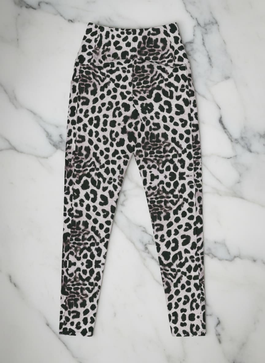 Leopard print leggings on a marble surface