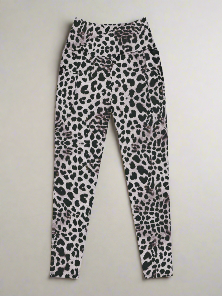 Front flat lay view of Savannah Charge Crossover Leggings with pockets and leopard print, on a white background