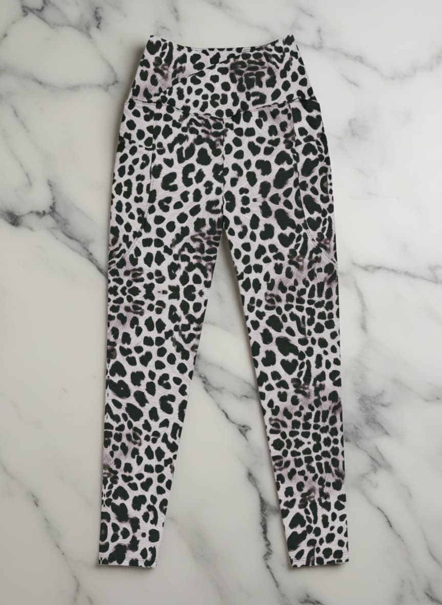 Leopard print leggings on a marble background