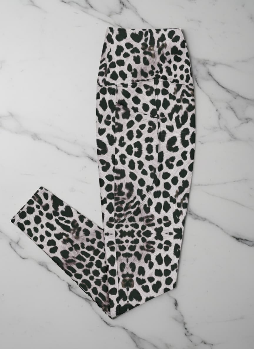 Leopard print leggings on a marble surface