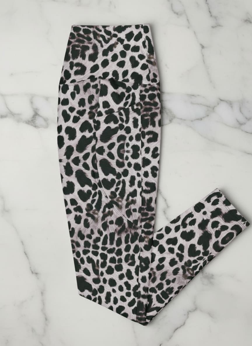 Leopard print leggings on a marble surface