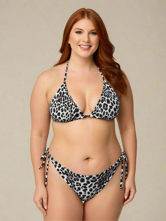 Woman wearing a leopard print bikini against a beige background