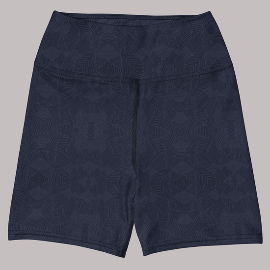 Front view of navy and blue, Shadow leaf Yoga shorts with gentle leaf pattern on a light grey background