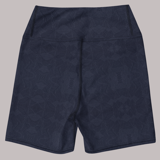 Back view of navy and blue, Shadow leaf Yoga shorts with gentle leaf pattern on a light grey background by Pixie and Sherbet.
