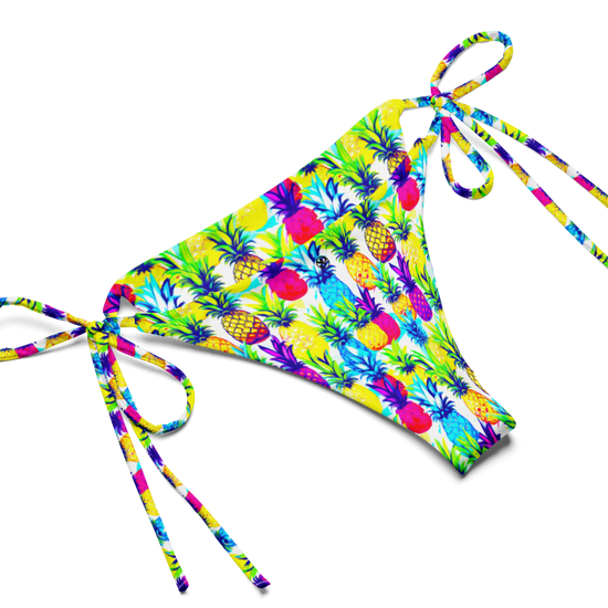 Bottom-half, flat-lay view of bright yellow, pink, purple and blue coloured Tropic Like It's Hot String bikini.