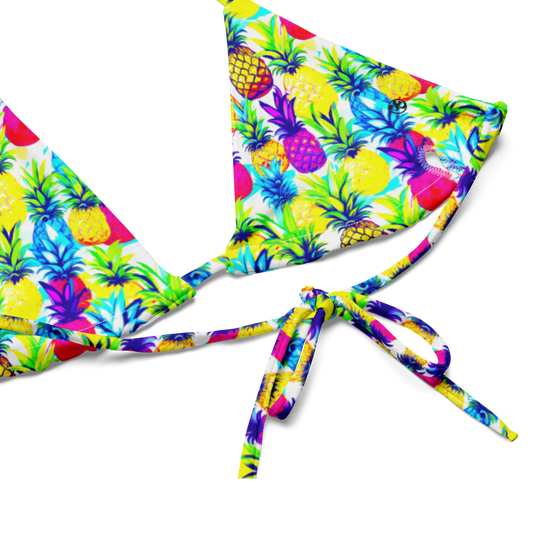 Top-half, flat-lay view of bright yellow, pink, purple and blue coloured Tropic Like It's Hot String bikini, by Pixie and Sherbet.