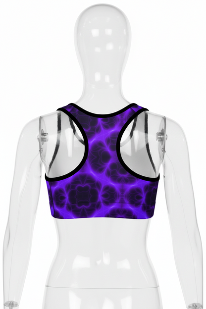 A racerback sports bra with a vibrant purple and black psychedelic pattern on the front and solid white lining on the underbust cups, outlined with black trim. 