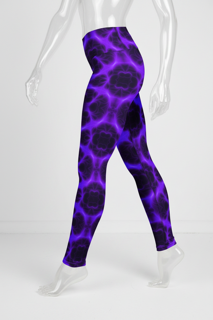 A mannequin modeling high-waisted leggings with a purple and black cellular or bubble-like pattern, shown from the waist down against a plain white background.