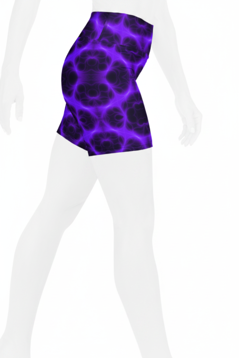 A mannequinl wearing high-waisted athletic shorts with a vibrant purple and black abstract organic pattern, shown against a plain white background.