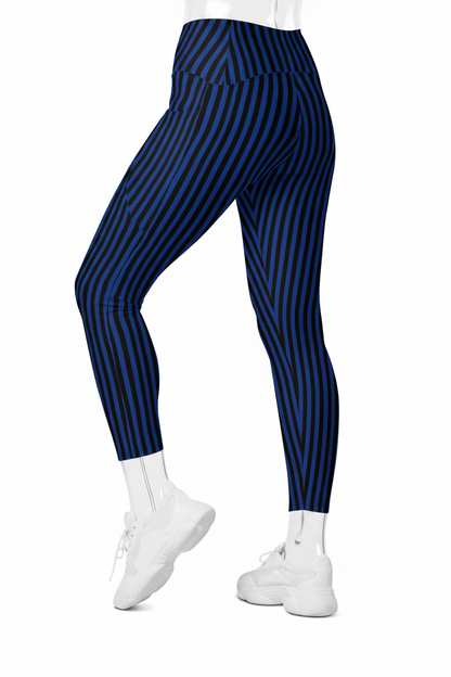 A mannequin wearing high-waisted leggings with vertical navy and royal blue stripes, paired with white sneakers, shown from the waist down on a plain white background.